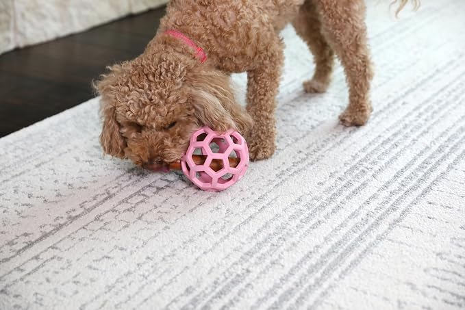 JW Pet HOL-ee Roller Dog Puzzle Ball, Medium 4.5in, Natural Rubber, Pink | Puzzle Ball Design Dog Toy for Interactive Play and Chasing Fun
